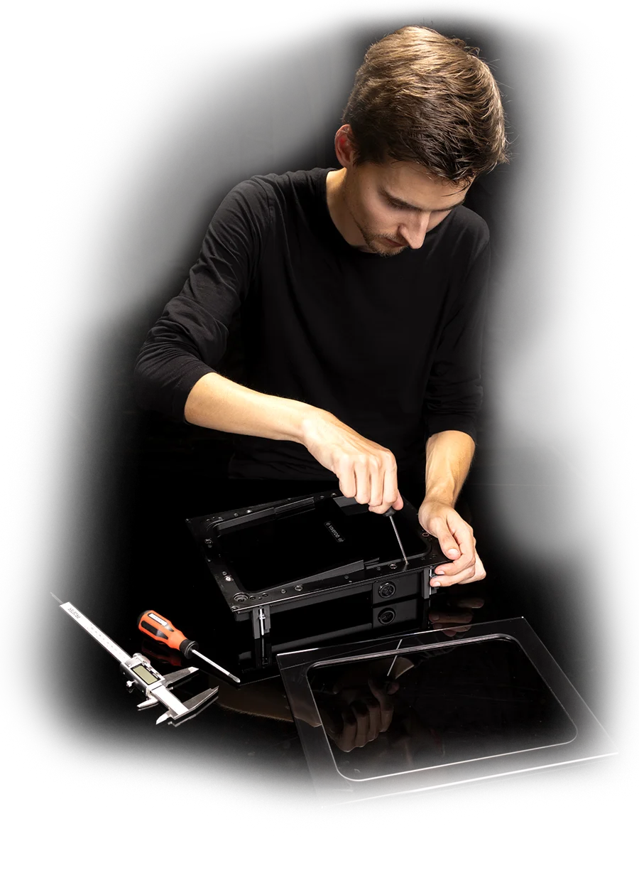 STANDED studio craftsman assembling a zero bezel